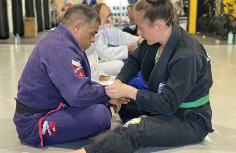 Judo class working on grips